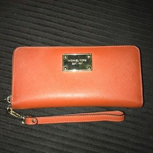 Used Michael Kors zip around long wallet